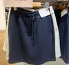 Saia curta casual de secagem rápida para mulheres, novo modelo versátil de outono 2026, saia reta fashion com cintura elástica 492915