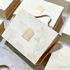 2026 Nova Caixa de Presente Festiva Estilo Chinês com Tampa Flip Caixa de Doces para Casamento Lembrancinha de Noivado Caixa de Doces para Banquete Lua Cheia Tendência Nacional