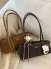 Bolsa de Ombro Simples Retrô Coreana para Mulheres 2025 Nova Moda Outono e Inverno Bolsa de Mão Elegante para o Dia a Dia Bolsa de Ombro