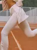 Preventa de Xichen: Diseño irregular, falda de tenis y leggings de dos piezas simulados, corte holgado y adelgazante, leggings de golf, pantalones largos