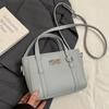Promoção Quente de Primavera Bolsa Balde Portátil de Alta Qualidade com Padrão de Lichia Casual Coreana Pequena Fresca Elegante Versátil Transversal Bolsa Feminina
