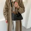 Tendência minimalista transfronteiriça outono 2026 nova moda bolsa de trabalho feminina casual personalizada bolsa de ombro transversal