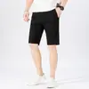 Shorts Casuais de Cor Sólida em Algodão Lavado 2026 Novo Verão Estilo Hong Kong Shorts Casuais Roupa de Trabalho Masculina Shorts de Praia