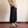 Pantalones de hombre bordados, pantalones deportivos casuales de ajuste holgado de moda otoñal, joggers de sudoración retro americanos de alta gama
