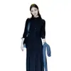 Vestido largo de punto negro de alta gama estilo francés para mujer, modelo nuevo de principios de otoño 2025, entallado a la cintura, vestido largo con capas interiores