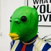 En stock celebridad de internet máscara de látex TikTok divertido cubierta de cabeza de pez verde expresión tallada en arena cubierta de cabeza de látex de pez extraño