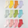 Nuevos calcetines adhesivos infantiles transfronterizos, calcetines de algodón, calcetines blancos, calcetines de bebé, calcetines infantiles al por mayor, calcetines para niños y niñas, calcetines de media pantorrilla