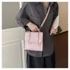 Mini mochila casual diaria estilo coreano, bolso cruzado de lunares de nicho para mujer, bolso de mano de moda trendy nuevo 2026