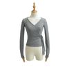 Elegante playera sexy de manga larga con cuello en V profundo, botón de amor, que reduce la edad, a la moda, combinable con todo, para chica hot, ajustada, con bajo irregular