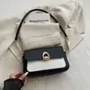 Bolso de axila de diseño vintage de nicho, nuevo y moderno bolso de sillín de moda, bolso de hombro simple, casual y versátil