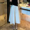 Conjunto de peça única/Moda de verão nova para mulheres: Conjunto de duas peças para mulheres: top de malha com cordão, caimento justo e manga curta + saia midi de cintura alta