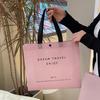 Loja de roupas de celebridade da internet bolsa de mão não tecido logotipo personalizado roupas compras presente bolsa atacado