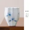Taza de té de cerámica azul con loto pintado a mano con color de engobe para el hogar taza para degustación de té pu'er juego de té kung fu taza de maestro taza individual