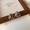 Pendientes de Botón Ovalados de Resina Transfronterizos Europeos y Americanos Pendientes Maillard de Otoño e Invierno Pendientes Simples de Moda Versátiles para Mujer Sensación de Alta Gama