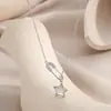 Cadena de Clavícula Elegante con Zirconia Galvanizada en Oro Real Diseño de Nicho Femenino Collar de Estrella de Concha Cadena de Pin de Moda para el Cuello