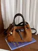 Bolso de mano transfronterizo, elegante bolso tipo cubo para mujer, nuevo bolso de hombro estilo coreano 2026, minimalista y de moda, bolso cruzado de nicho