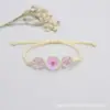Suministro de fábrica pulsera de flor seca Jingdezhen flor de encaje gypsophila narcisos flor de cerezo flor de durazno pulsera para amigas estudiantes