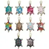 Venta caliente transfronteriza 10 color de aceite que gotea impreso pequeño colgante de tortuga creativo para llavero de coche accesorios colgantes