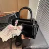 Bolsa Pequena Quadrada Versátil da Moda deste Ano para Mulheres 2026 Nova Bolsa de Ombro Transversal Casual de Comércio Exterior de Alta Qualidade com Textura