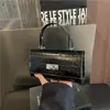 Bolso de mano de moda estilo coreano, nuevo diseño transfronterizo, bolso de hombro simple, bolso cruzado, bolso cuadrado pequeño para el trabajo, bolso de mano para mujer