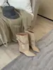 Botas femininas estilosas de cano médio 2026 outono e inverno novo estilo botas de cano único com mangas em retalhos e fivela de cinto botas da moda de perna larga