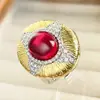 2024 nuevo Zhuangsheng joyería europea simulación corindón color sangre de paloma calcedonia verde traje retro propietario 10*12 al por mayor