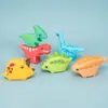 Juguete de Playa para Niños con Spray de Agua Esmaltado Goma Suave Animal Pequeño Dinosaurio Jurásico Juguete para Bebé