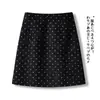 Falda midi de lunares versátil y a la moda de tiro alto adelgazante para mujer, falda corta de línea A, elegante retro, para ir al trabajo, casual, te hace ver más alta