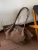 Bolsas femininas transfronteiriças novo modelo 2026, grande capacidade, bolsa de ombro versátil de alta qualidade, bolsa tote casual e estilosa