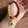 Pulsera de arena dorada púrpura de cinabrio de bajo contenido natural con colgante de paz, producto popular de venta al por menor en línea
