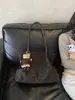 Bolso de hombro de gran capacidad con estampado de leopardo, nuevo bolso de axila para el trabajo, bolso versátil de moda casual de alta gama de nicho para mujer