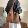 Bolso de moda versátil de un solo hombro para el día a día, nuevo bolso tejido elegante de gran capacidad para mujer 2026, tote de moda para otoño