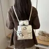 Mochila linda estilo coreano para mujer, diseño nuevo, estilo nicho, adecuada para uso diario, ir al trabajo y salidas, mochila pequeña, diseño de dibujos animados, gran capacidad