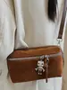 Bolsa Pequena com Textura Retrô Bolsa Feminina 2025 Outono Nova Couro de Alto Valor Bolsa Pequena Quadrada Bolsa Transversal Simples