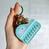 Nuevo Llavero de Mini Piano Transfronterizo Dibujo Animado Lindo Tocando el Piano Sanrio Juguete Musical Colgante Pequeño