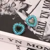 Pendientes de botón para oreja aretes aretes de moda retro de temperamento de lujo ligero exquisitos de diamantes completos europeos y americanos love azul de nicho