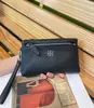 Bolsa de Mão Europeia e Americana Simples de Couro Bovino de Primeira Camada para Mulheres Bolsa Popular para Celular de Estudante Bolsa Pequena Elegante Troca Couro Genuíno