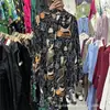 Moda Femenina Europea y Americana 2025 Camisa Estampada de Manga Larga Estilo Ins Moderna de Longitud Media Top de Diseñador