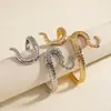 Pulsera circular abierta trenzada metálica plisada transfronteriza europea y americana con un ambiente vintage, de lujo ligero y sensación de alta gama