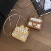 Primavera 2026 Nuevo Estilo Coreano Nicho Lazo Tejido de Paja Mini Bolso Cruzado Estilo Chanel Mini Bolso Cruzado de Hombro Único