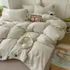 2026 Novo Conjunto de Roupa de Cama de Algodão Lavado Conjunto de Quatro Peças Estilo Muji Listrado Botão Tecido Colorido Jacquard Casa Quarto Conjunto de Quatro Peças