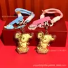 Chaveiro Criativo Personagem Estrela Fofa Desenho Animado Ouro Puro Cordão para Bolsa Diária Nicho Presente de Feriado Atacado Personalizado