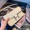 Bolsa Kangkang de Alta Qualidade 2026 Novo Estilo Horizontal, Bolsa de Ombro Único Elan para Axila, Pequena Bolsa Transversal Feminina de Couro Genuíno com Padrão de Palma