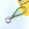 Chaveiro de corda trançada com anel duplo chaveiro de couro PU colorido novo pingente para bolsa feminina chaveiro para pendurar na cintura