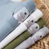 Camiseta de manga corta con cuello redondo, camiseta base de color liso para hombre y mujer, top de algodón puro, top liso de color puro blanco de manga corta