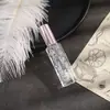 Botellas de muestra de perfume de fábrica, botellas de vidrio de alta gama, botellas rociadoras portátiles para viajes, botellas vacías y dispensadores cosméticos