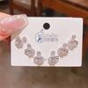 Verano nuevo chapado en oro real exquisitos tres pares de aretes pequeños de alto sentido pequeños frescos dulces aretes de temperamento combinables