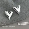 Pendientes de corazón brillantes minimalistas de temperamento moderno, nicho de alta gama, personalidad exagerada, pendientes transfronterizos europeos y americanos para mujer