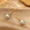 Pendientes de perlas de nicho retro exquisitos para mujer, estilo francés, largos y elegantes, nuevos pendientes de lujo explosivos y ligeros 2024