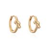 Australia Europa antigua y Estados Unidos moda transfronteriza simple chapado en cobre oro de 18 quilates pendiente de aro anudado de personalidad para mujer nicho vintage pendientes versátiles